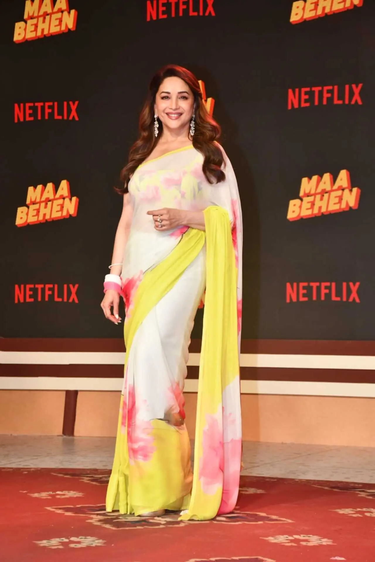 Madhuri Dixit looked graceful as ever at the trailer launch of Maa Behen. The actress turned heads in a stunning floral saree featuring soft pastel hues with neon accents. Madhuri Dixit looked graceful as ever at the trailer launch of Maa Behen. The actress turned heads in a stunning floral saree featuring soft pastel hues with neon accents.